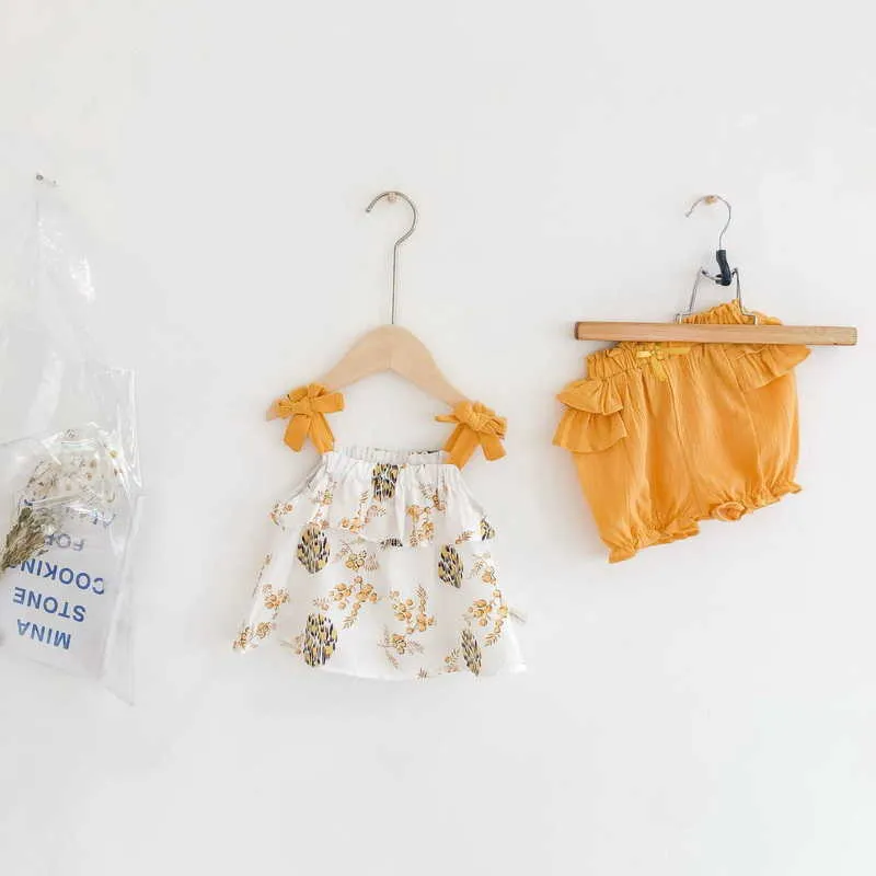 Verano niños niñas 2 piezas conjuntos flor amarilla arco Sling chaleco + cintura elástica volantes pantalones cortos niños ropa E6006 210610