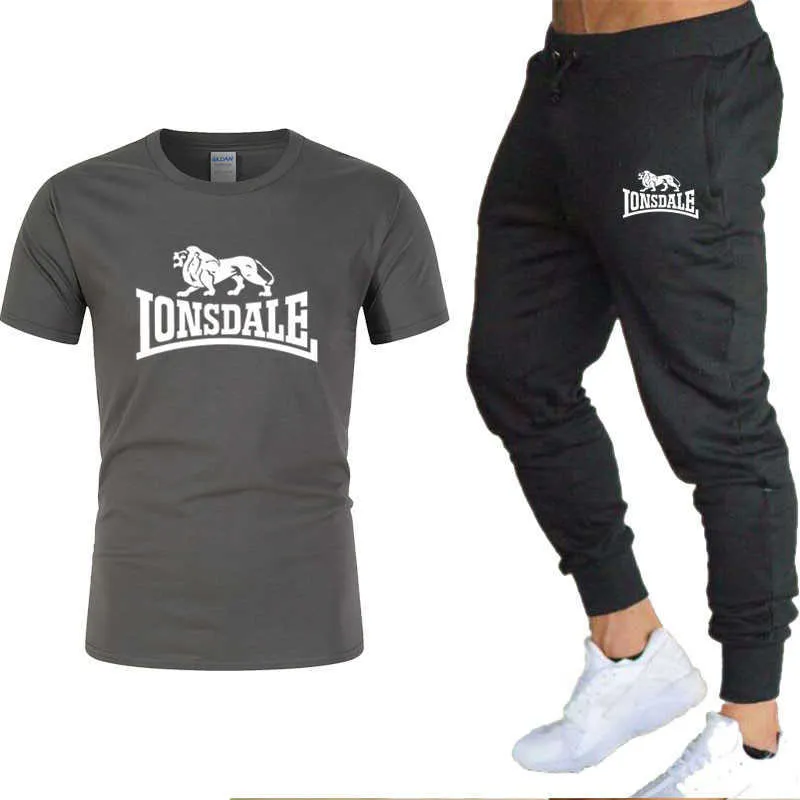 2020 Completi da uomo T-shirt pantaloni Due pezzi Set Casual Tuta da uomo / donna Nuova stampa di moda abiti sportivi Pantaloni da palestra X0909