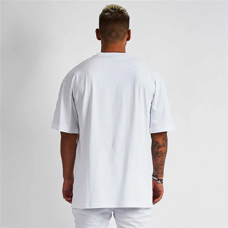 T-shirt oversize solida T-shirt da uomo Bodybuilding e fitness T-shirt casual da palestra T-shirt da uomo streetwear allentata T-shirt hip-hop 210726