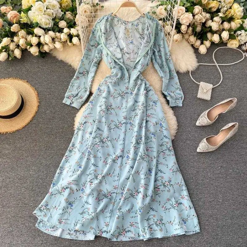 Dame Elegantes Blaues Blumendruckkleid Damenmode Rundhalsausschnitt Ausgehöhlte Langarm A-Linie Vestidos N720 210527