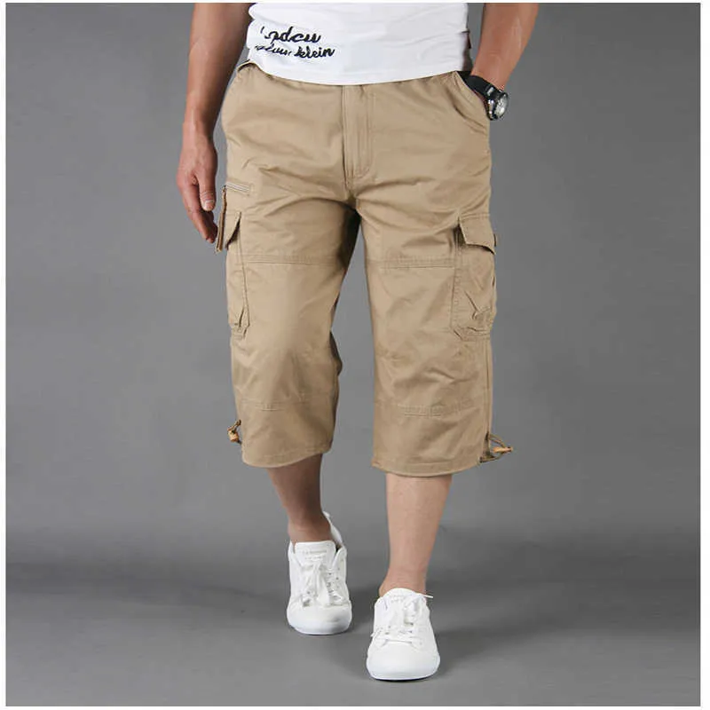 Pantalones cortos de carga de verano Hombres Casual s Camuflaje Pantalones sueltos con múltiples bolsillos Pantalones tácticos al aire libre Tallas grandes 5XL 210714