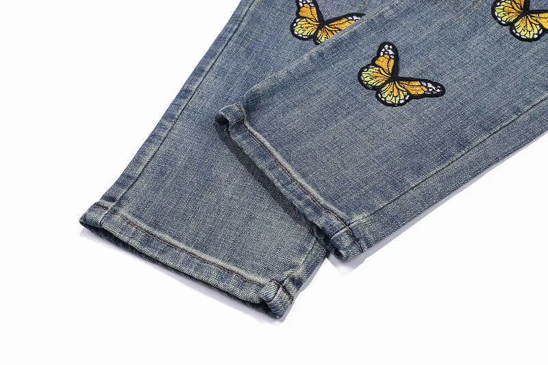 Jeans pour hommes Gaojiefeng industrie lourde trou de coupe tridimensionnel motif de broderie papillon abeille jeans à petites jambes