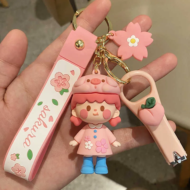 New Pink Cherry Blossom Girl Keychain Cute Girl Exquisite Zaino Pendente tridimensionale Cartoon Car Portachiavi Regali all'ingrosso G1019