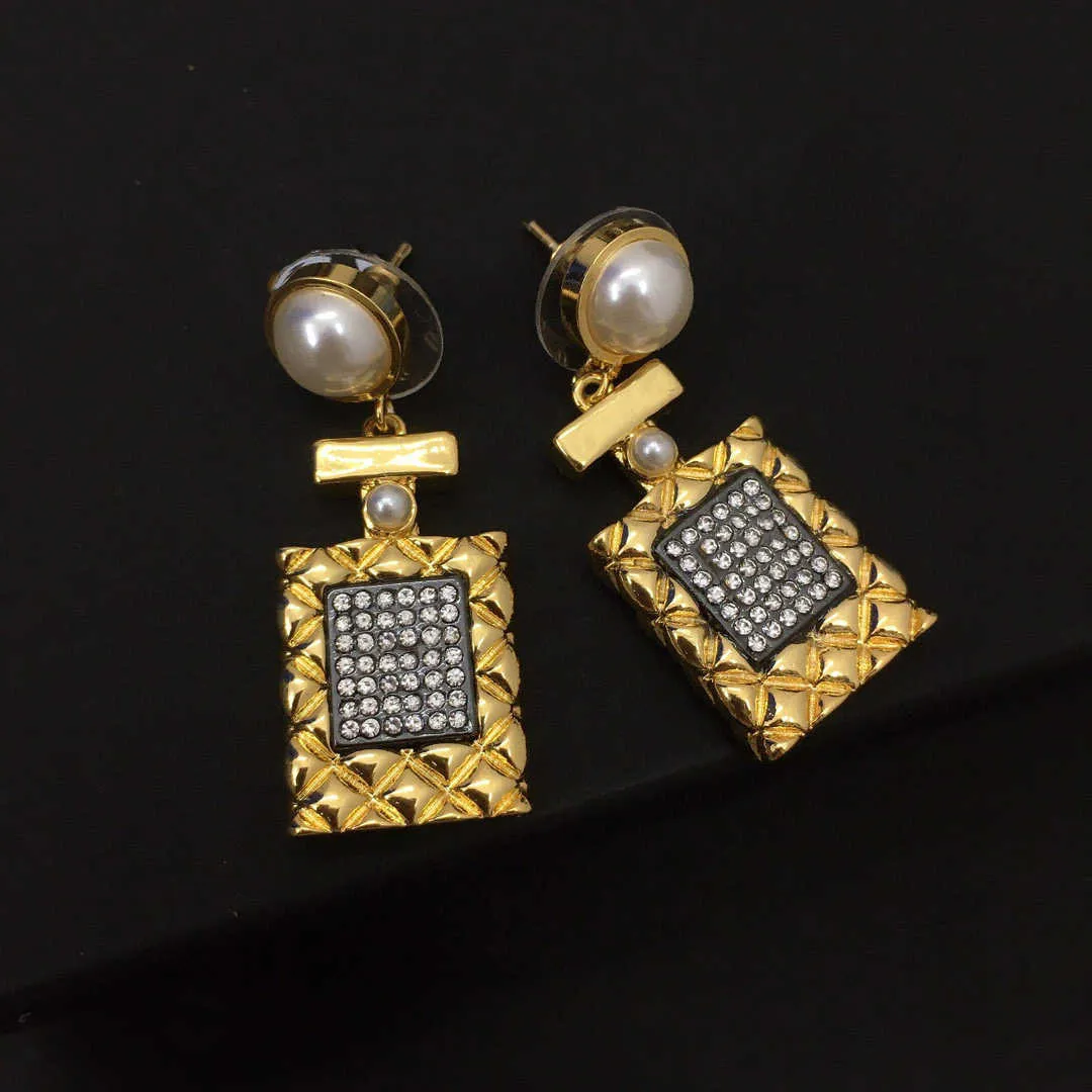 Marka moda bownot biżuteria złota kolor perfum butelki kolczyki camellia luksusowe frędzle perły design na przyjęcie weselne 7770319