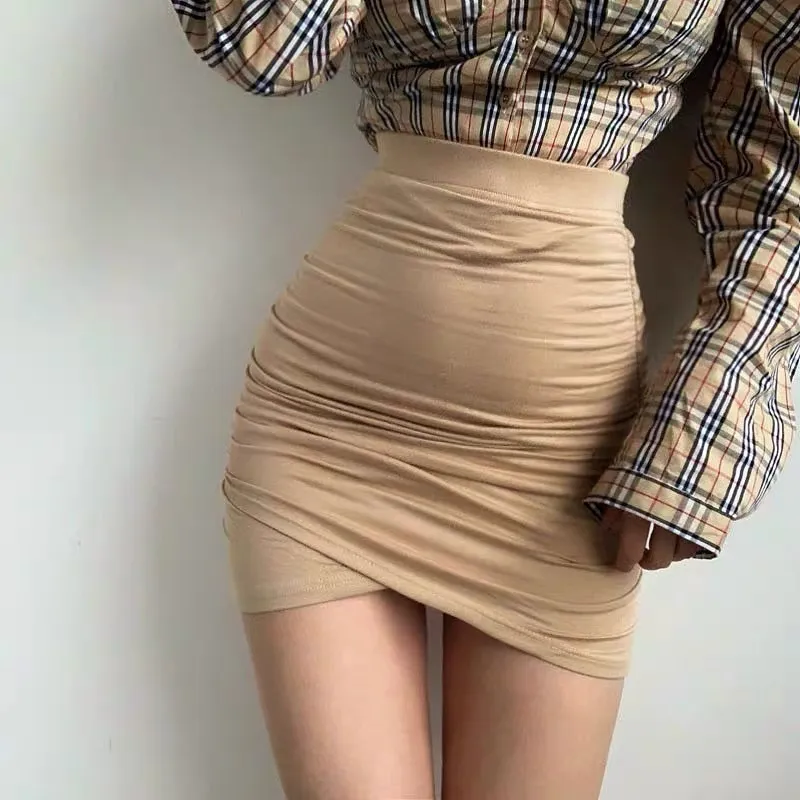 XIABNI taille haute bandage plissé jupe courte femme sexy street party serré élastique Mini wrap hanche jupe abricot irrégulier 210331