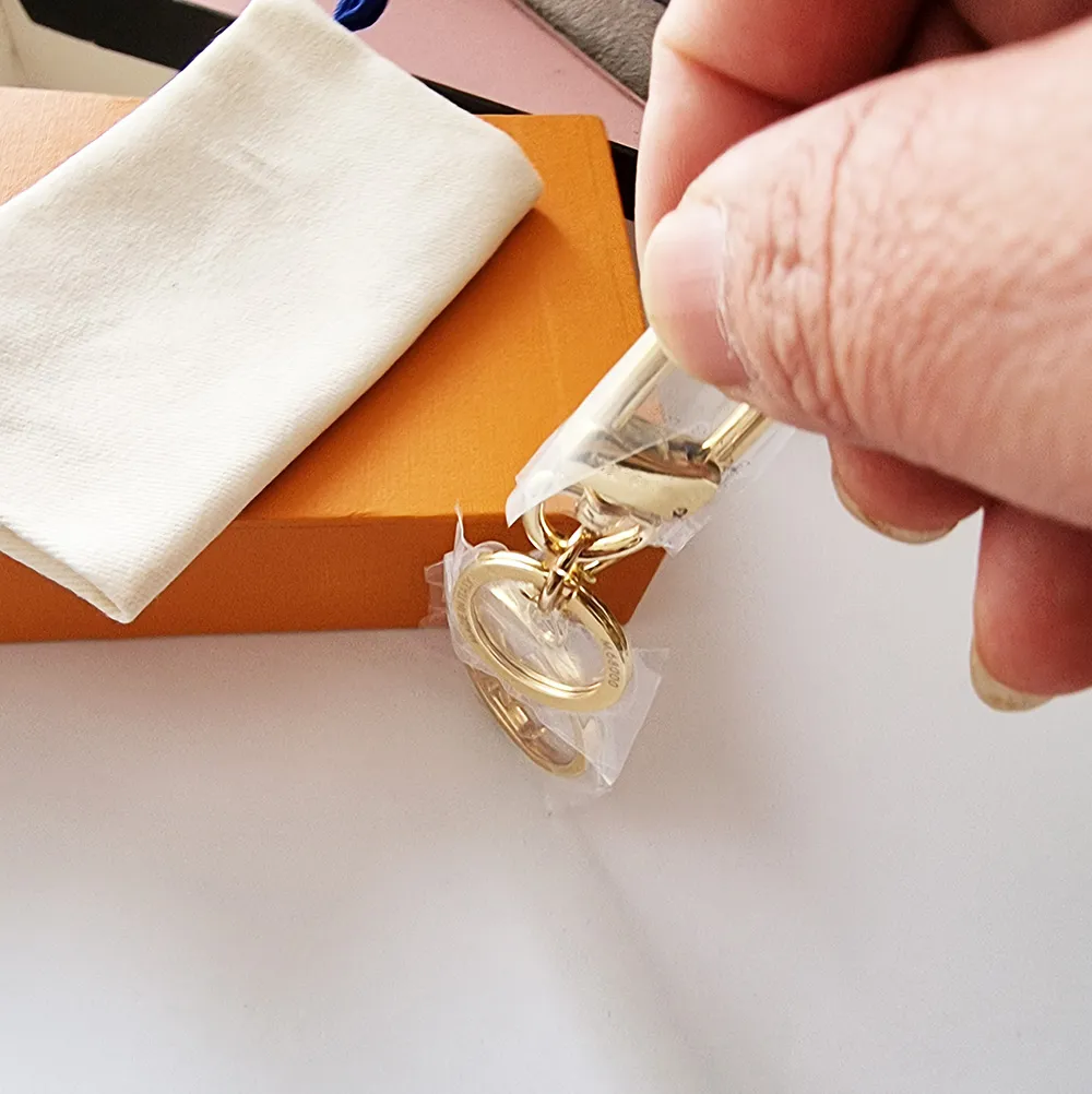 Nieuwe legering gouden ontwerp astronaut sleutelhangers accessoires designer sleutelhanger massief metalen autosleutel ring geschenkdoos packing292S