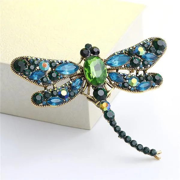 Pins, spille Adolph Jewelry Arrivas Accessori Temperamento lucido cristallo Dragonfly Spiro donne vestiti spille sciarpa