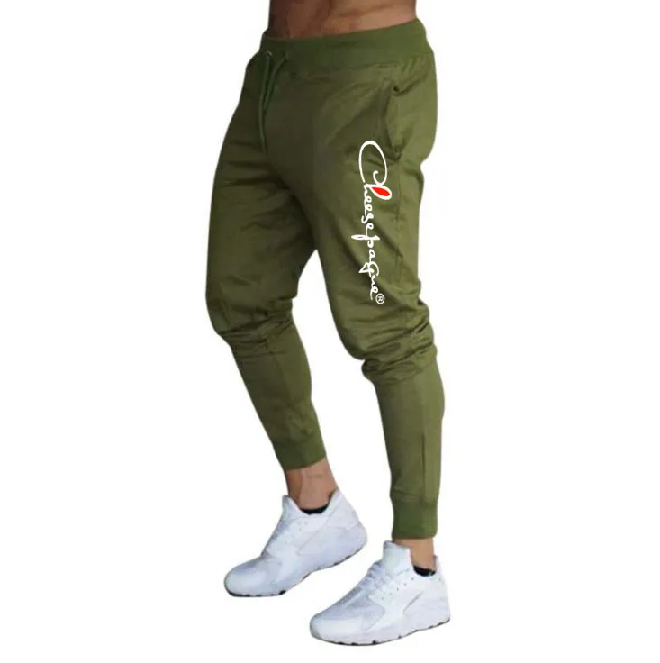 Merkbrief afdrukken Spier Fitness Hardloopbroek Training Sport Katoenen broek Heren Ademende Slim Beam Mouth Casual Gezondheidsbroek