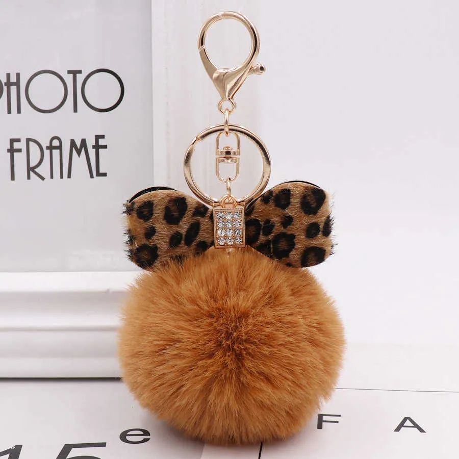 8 CM Leopard Print Pompon Portachiavi Fluffy Faux Pelliccia di Coniglio Palla Donne Borsa Pendenti con gemme e perle Portachiavi Auto Arco di Cristallo Portachiavi Gioielli G1019