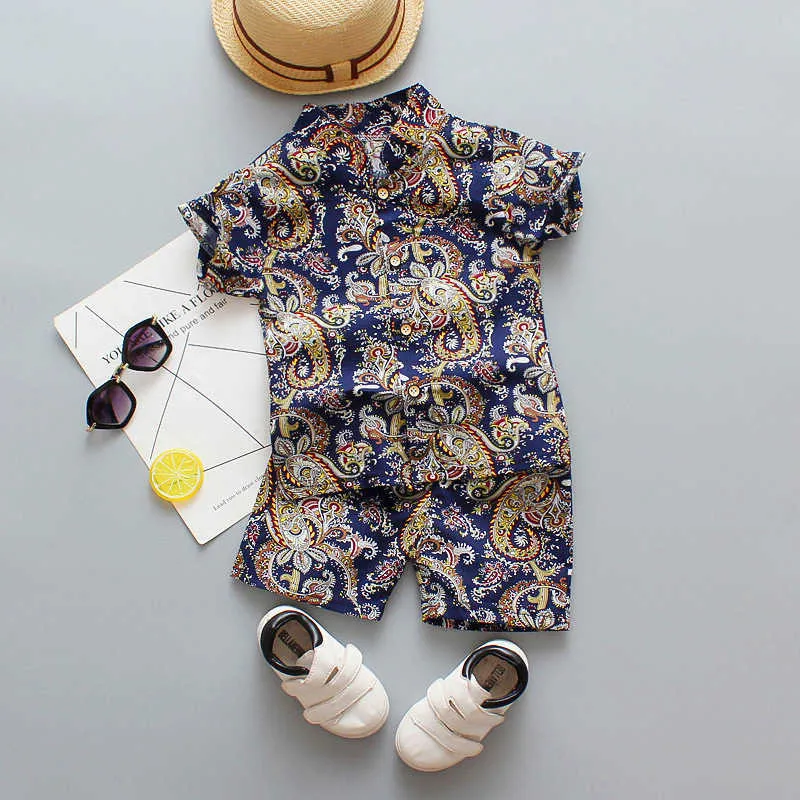 Ensemble de vêtements imprimés floraux pour bébés garçons, nouvelle mode, chemise d'été + pantalon, 2 pièces, vêtements pour enfants, tenue de plage de vacances pour enfants de 1 à 4 ans