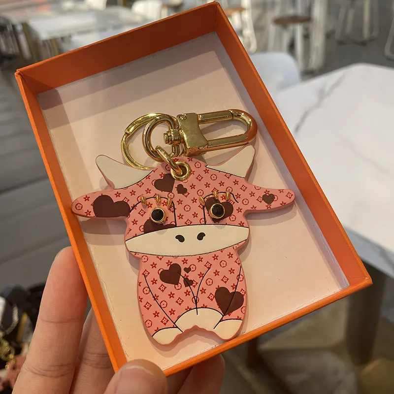 fashion Whole presbyopic bull devil bag ornaments car hanging pink and tender calf car key chain pendant cute year of the ox k260W