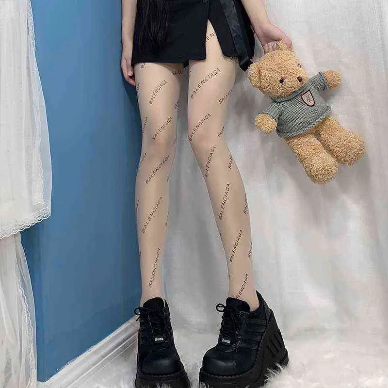 Doiaeskvファッションセクシーな女性Pantyhoseプリントブラックレターダンスストッキング女性靴下メッシュフィッシュネットタトゥーパターンタイツY1130