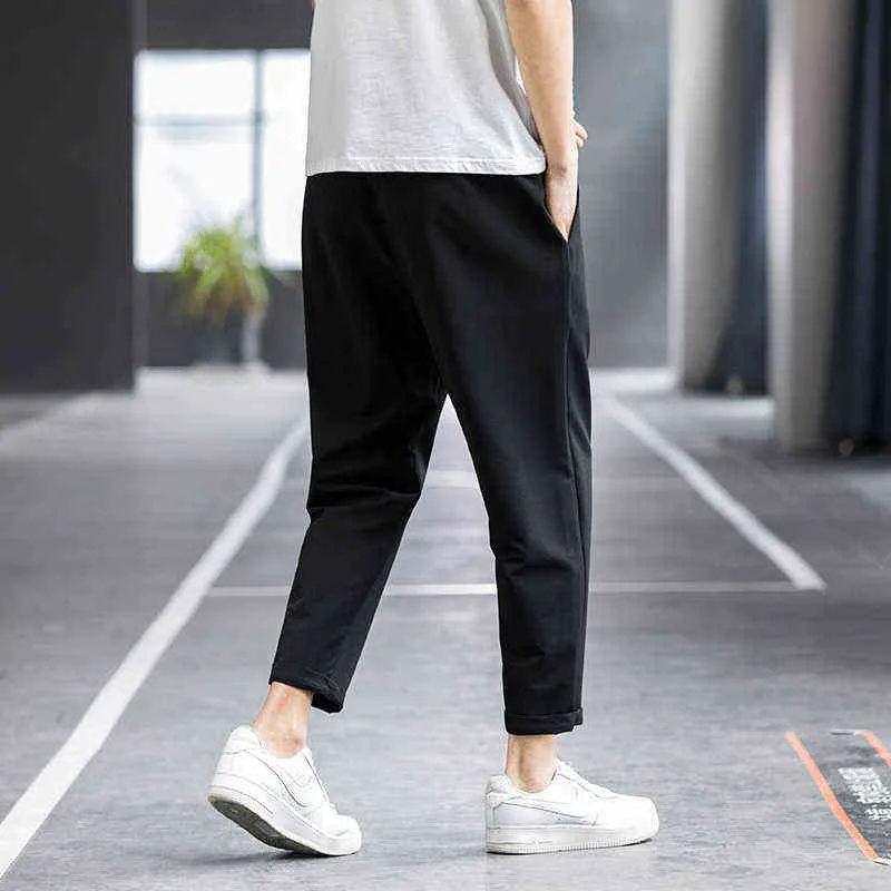 Hommes été printemps mode décontractée séchage rapide respirant couleur unie pantalon mâle léger rue Fitness Joggers pantalon 211112