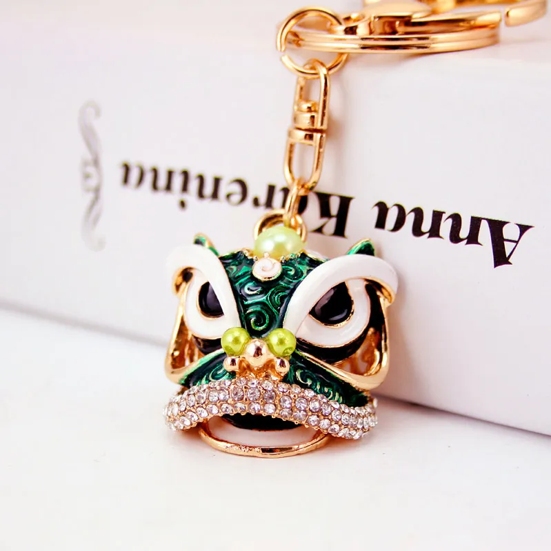 Creative style chinois goutte huile artisanat petit cadeau tête de danse du lion porte-clés de voiture pendentif en métal porte-clés sac pendentif mascotte