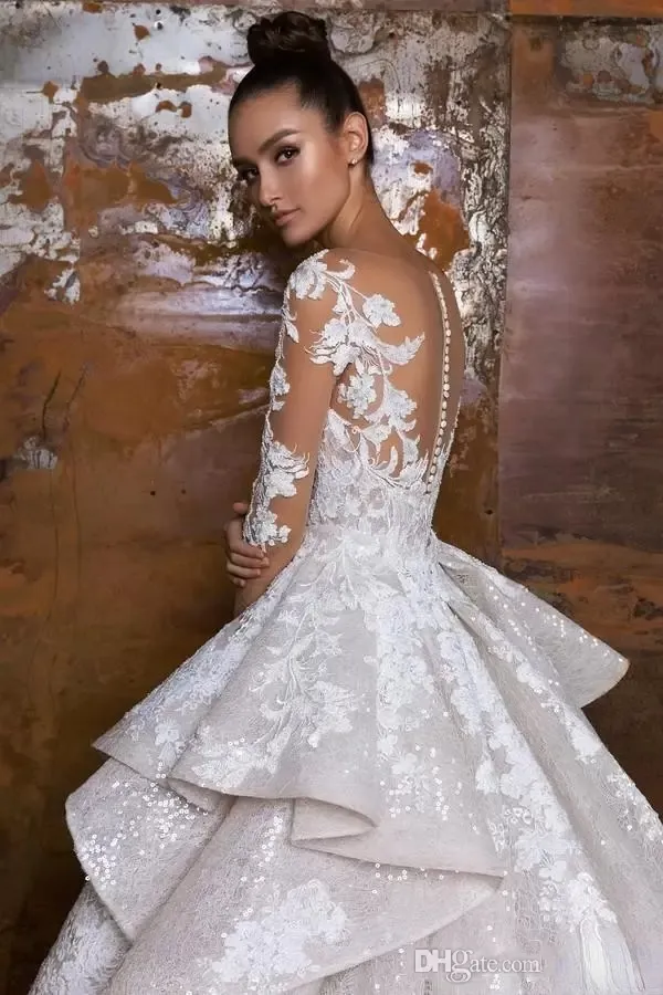 2022 Robes de mariée de sirène de designer avec train détachable manches longues en dentelle appliquée robes de mariée illusion corsage pays Weddi194h