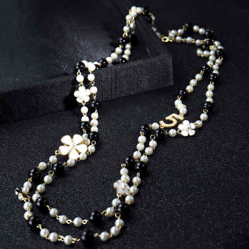 Kvinnor av hög kvalitet Långa hängen lager Pearl Necklace Collares de Moda nummer 5 Flower Party Jewelry281N8394376