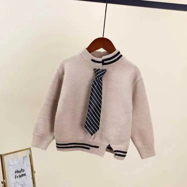 2021 Nueva ropa para niños de invierno Suéter de punto Ropa para niños con corbata Cool Jerseys Chicas Suéteres de punto Abrigos Ropa de punto cálida Y1024