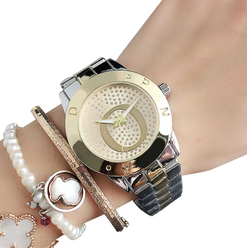 Marque de mode montres femmes dames fille cristal grandes lettres Style métal acier bande Quartz montre-bracelet P732435