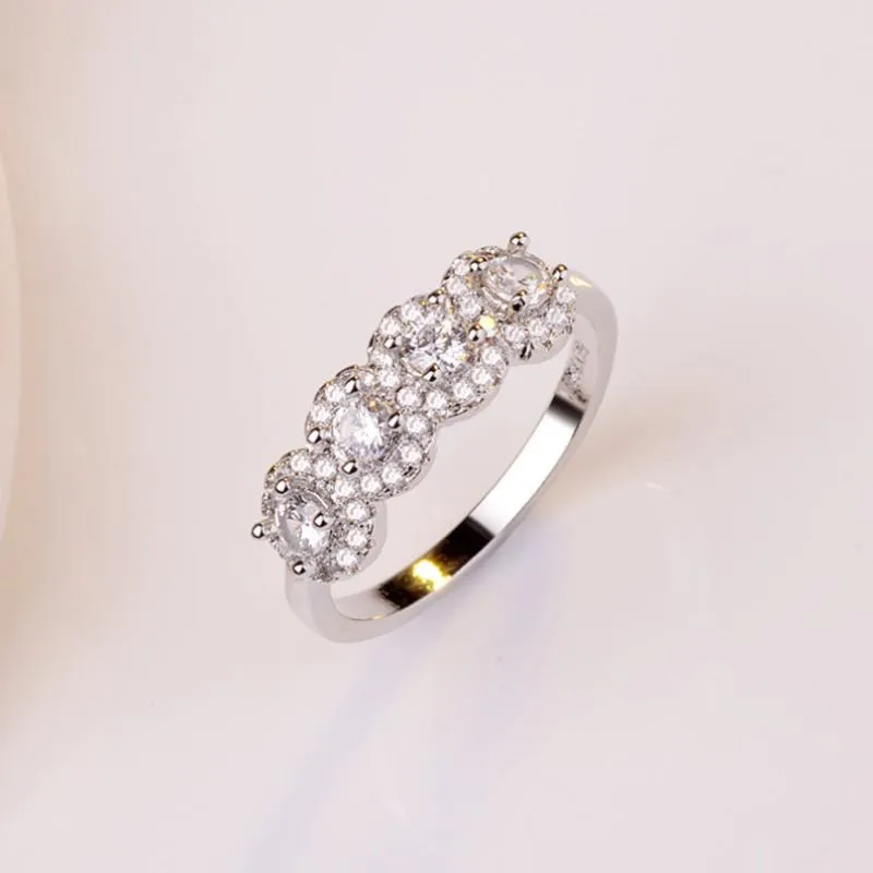 Pierścienie ślubne Rozmiar 4-12 Sprzedaj Wysokiej jakości luksusowa biżuteria 925 srebrna okrągła Pave 5a CZ Eternity Pierścień Wynn22276o