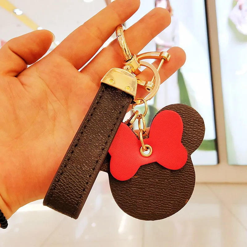 2021 Key Chain Cartoon Fashion Handmased Leather Material Mens and Womens Handbags Pendant Car Keychains Lover Gift255o