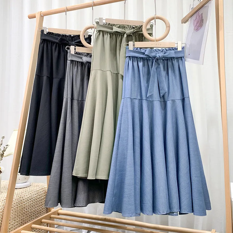 Fashion high waist skirt casual solid color bow tie drape stitching large swing Skirt for womens mid-length a-line 210420