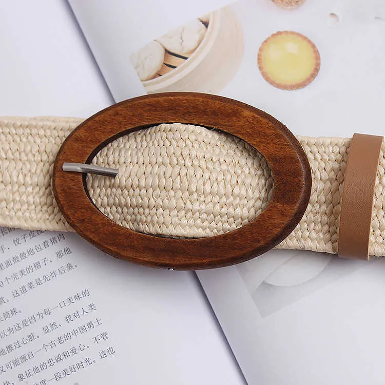 Nieuwe ontwerper Good Wooden Buckle Elastic Grass Woven Belt For Ladies Holiday Wind Seaside Boheemse etnische elastische riem G102623977574