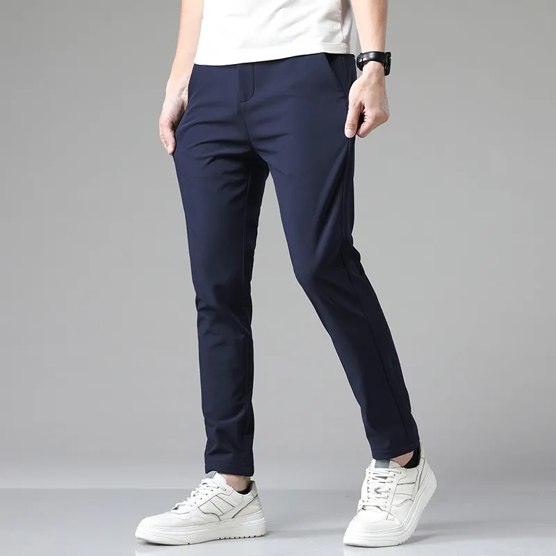 Летние брюки мужские эластичные корейские повседневные облегающие брюки для бега с эластичной резинкой на талии Классические деловые брюки мужские черные, серые, синие 28-38 220315
