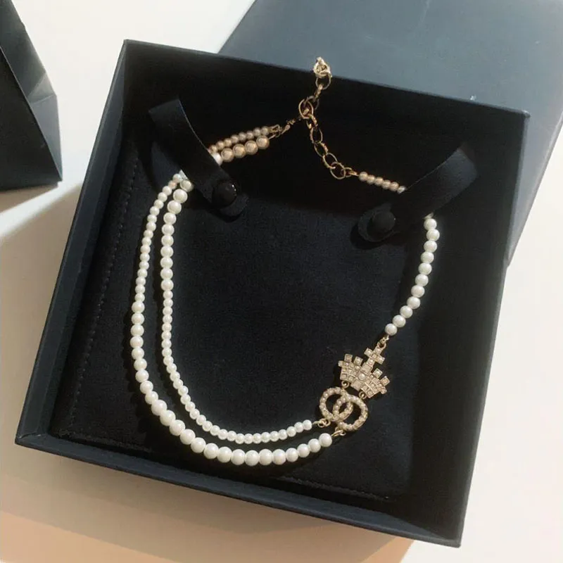 Dubbel Pearl Necklace Womens Jewelry Designer Crown Pendant Necklace Luxury C Högkvalitativ klassisk modehalsband Kolkedja 335S