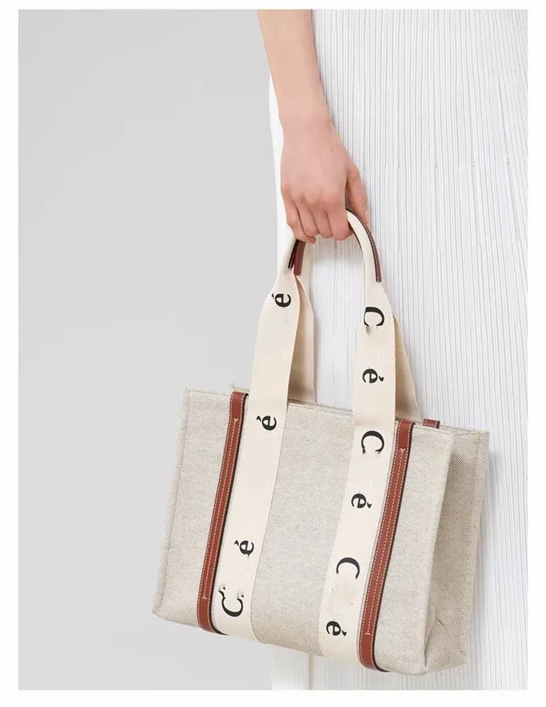 Axelväska shopping väskor brev tryck rand kvällspåsar stor kapacitet på duk kvinnlig japansk casual handbag269a