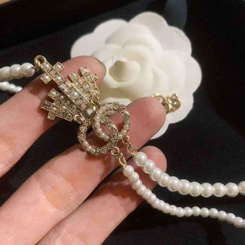 Dubbel Pearl Necklace Womens Jewelry Designer Crown Pendant Necklace Luxury C Högkvalitativ klassisk modehalsband Kolkedja 335S