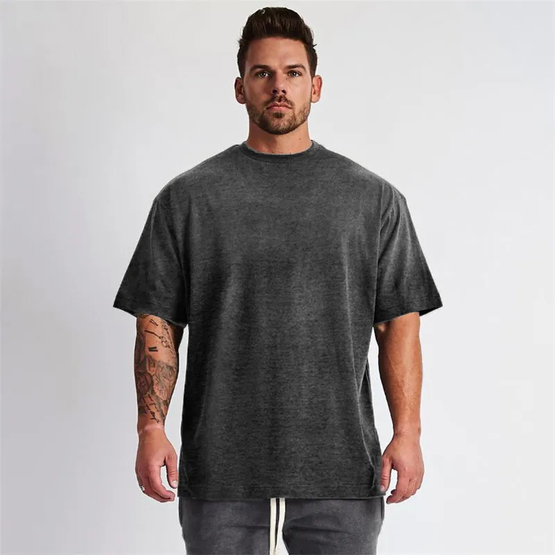 Muscleguys Oversized Camiseta T-shirt Homens Ginásio Bodybuilding e Fitness Loose Casual Lifestyle Vestimento T-shirt Streetwear Hip-Hop Tshirt 210421