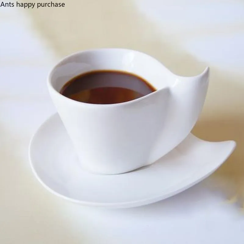 Tasses en céramique de Style européen, tasse à café et soucoupe en forme de cœur fantaisie, ensemble de thé virgule blanc pur, ustensiles créatifs 272S