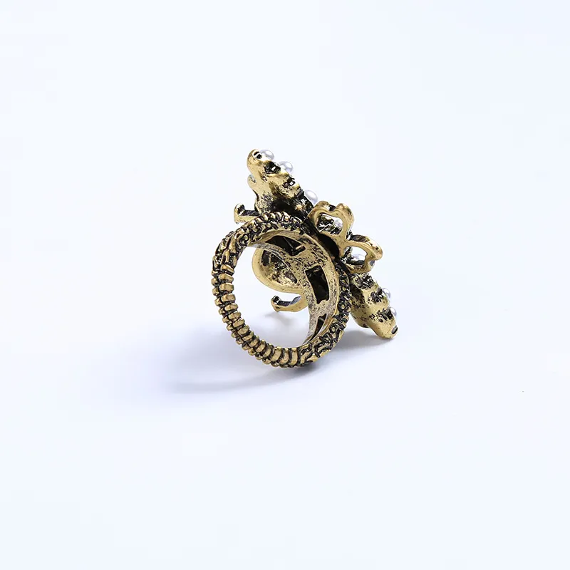 Europa und Amerika Neue trendige Männer Frauen Mode Ring vergoldet Strass Perle Biene Ring schönes Geschenk für Freunde NL-711297R