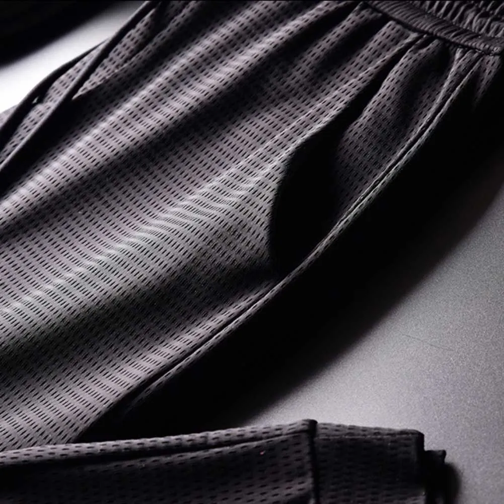 Pantalon décontracté en soie de glace noire pour hommes Cool et confortable respirant poches à lacets pantalon à cordon Y0811
