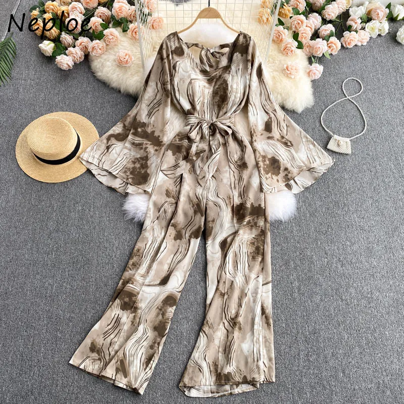 Neploe semestertryck Bohemian Jumpsuits Kvinnor Hög midja Hip Sashes Wide Leg Bodysuits V Neck Flare Långärmad Playsuits Sommar 210510