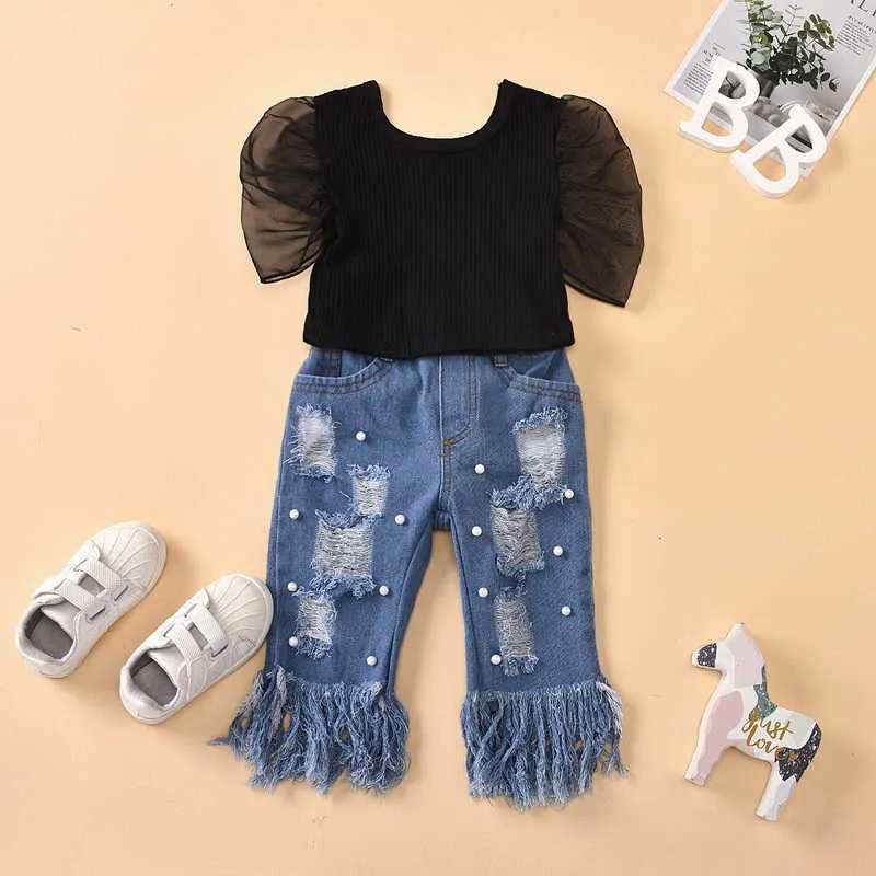 Groothandel zomer meisje 2-pcs sets zwart bladerdeeg korte mouwen + gat kwast parel jeans kinderen outfits E1789 210610