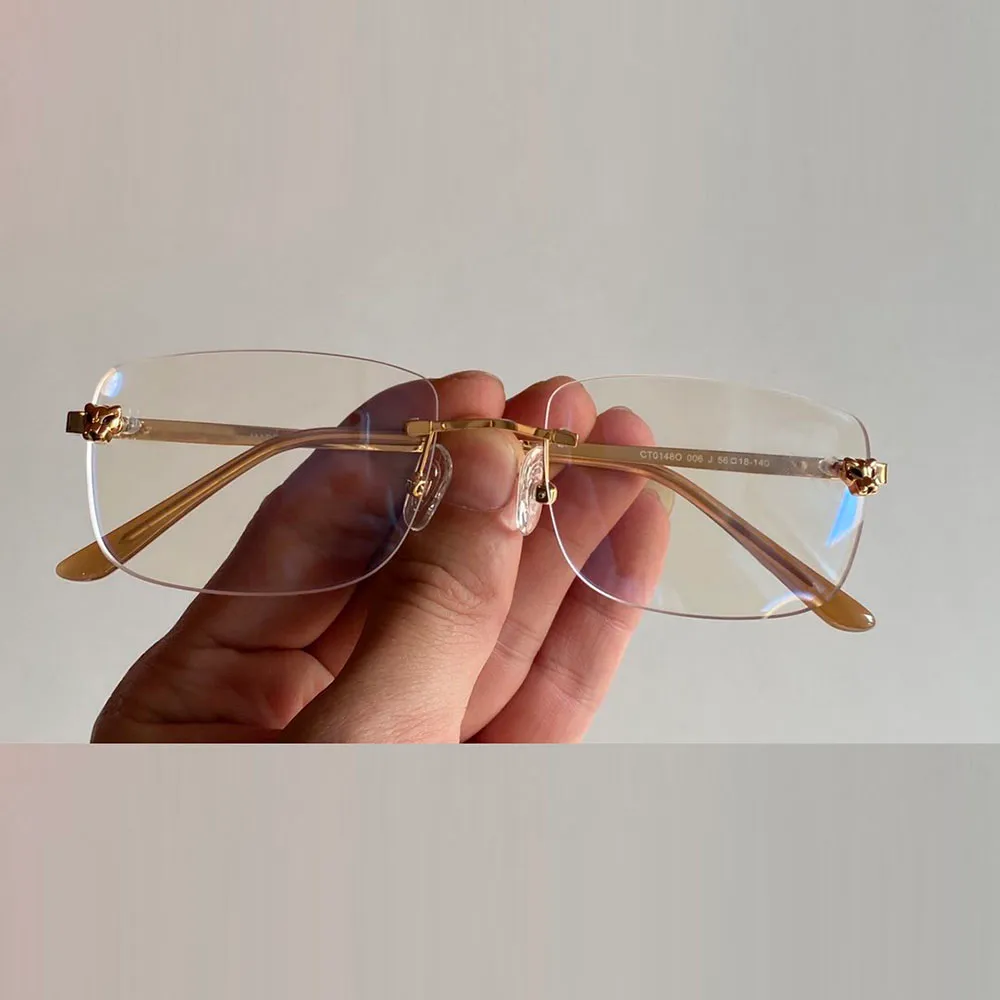 Uxury Designer Eyeglasses光学メガネヒョウヘッドデコレーションフレームリムレスアンチラウンドクラシックメンズ女性アクセサリーファッションS329K