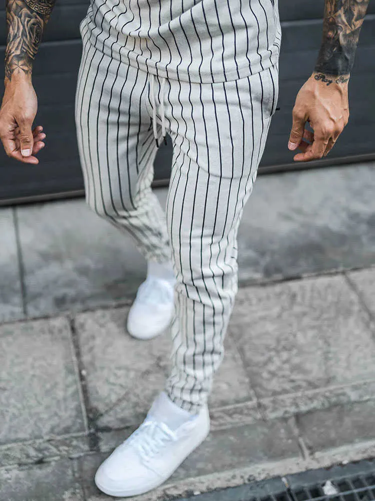 Nouveaux ensembles pour hommes Survêtement Casual Stripe Sport Costumes Fitness Zipper Vêtements Pantalons de survêtement Slim Fashion European TrendsTracksuits Set X0610