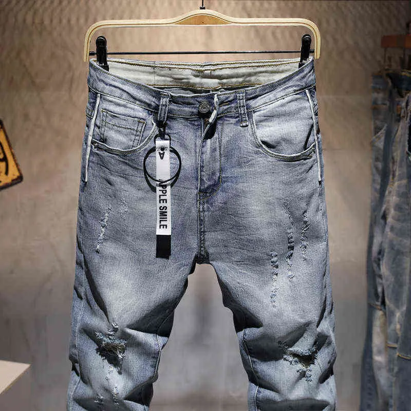 Hommes Ripped Casual Skinny Jeans Pantalons Marque de mode Homme Streetwear Lettre imprimée Trou en détresse Pantalon en denim gris 211111