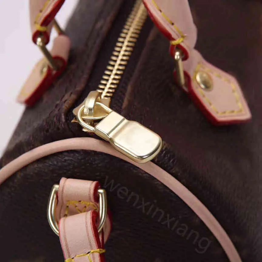 grossist Kvinnor Messenger Resväska Klassisk stil Mode Axelväskor Lady Totes handväskor Speedy Cylindrisk kudde crossbody väska