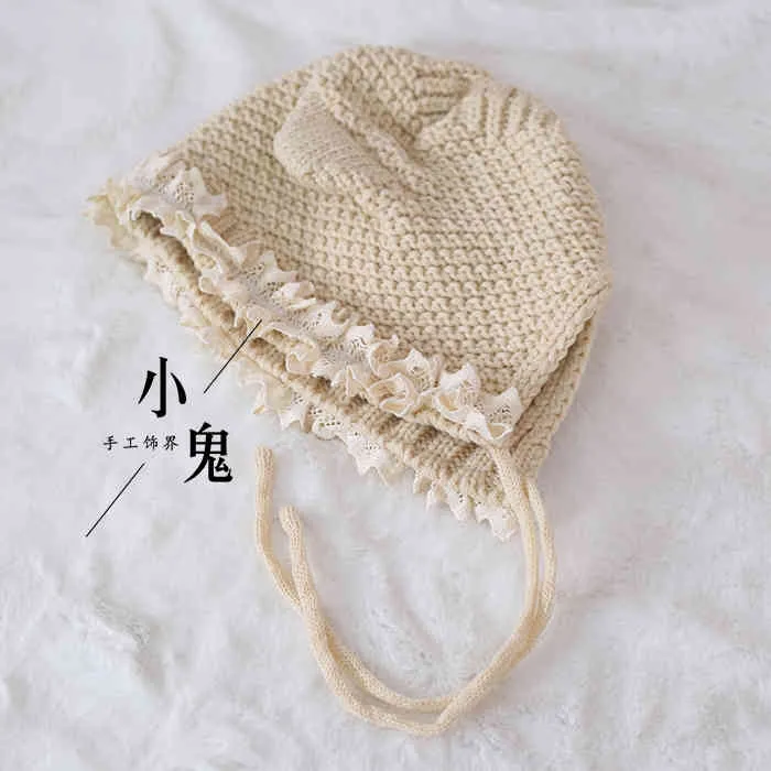 Oreille de chat Lolita douce fille japonaise laine faite à la main femme automne et hiver dentelle française chapeau chaud