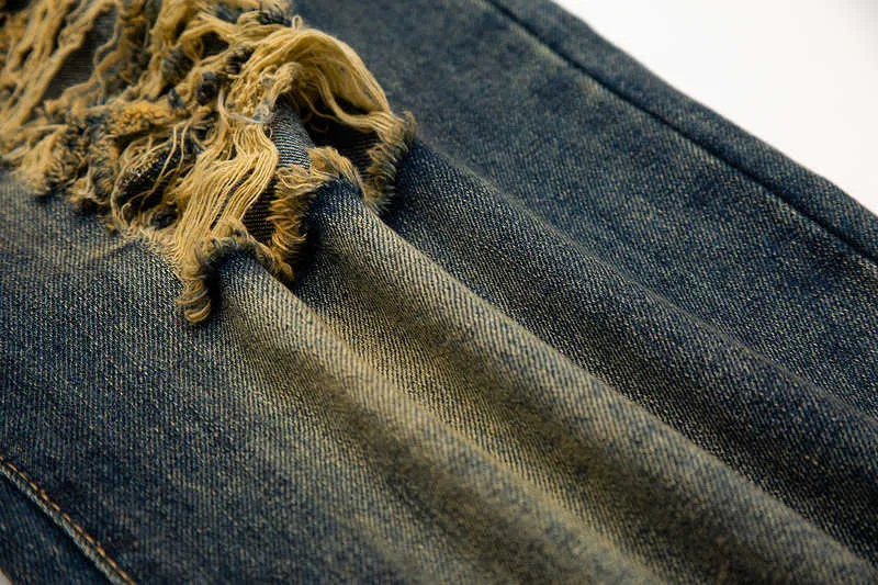 Jeans pour hommes L'industrie lourde du vent de la grande rue a utilisé des jeans décontractés droits à trous lavés