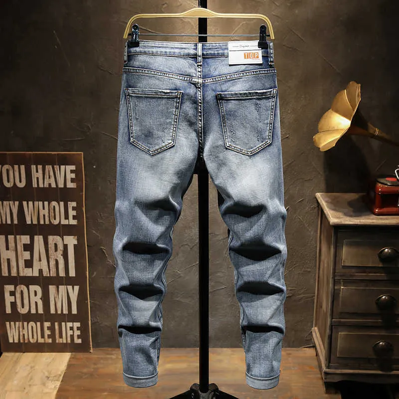 Europejskie Mężczyźni DSQ Marka Slim Jeans Dżinsy Spodnie Stretch Blue Patchwork Hole Spodnie dla mężczyzn Ripped Jeans JS1059 X0621