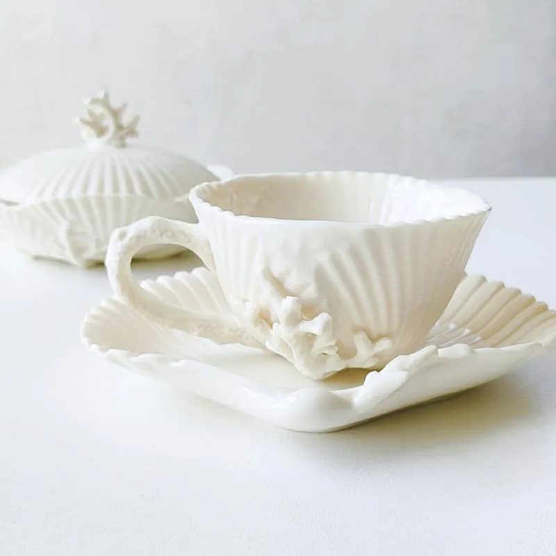 Filiżanki spodki High-end Coral Shell Relief Coffee Cup i spodek Ceramiczny popołudnie Teacup Creative Porcelain Tazas de Cafe292v