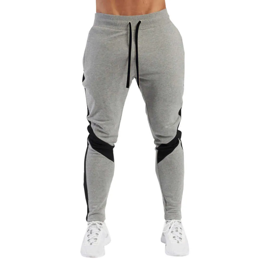 Pantaloni sportivi invernali Patchwork a righe Palestra Fitness Running Pantaloni da allenamento Pantaloni casual da uomo Pantaloni da uomo Pantaloni da uomo Y0811