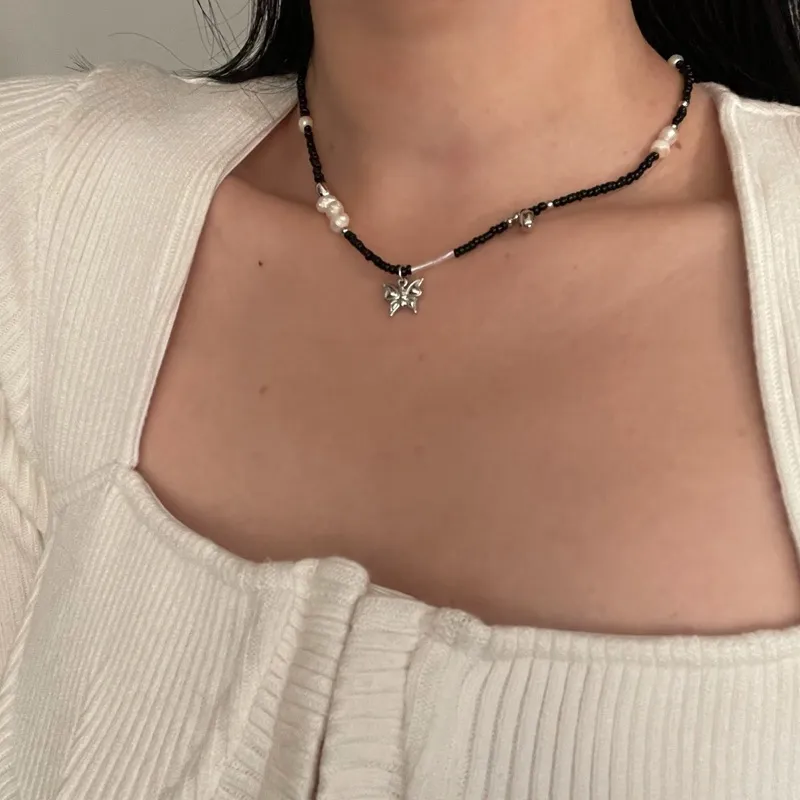 TIMEONLY Moda Coreana Imitazione Perla Farfalla Cuore Choker Neckalces Donna Donna Gioielli in Bianco Nero Collana Barocco