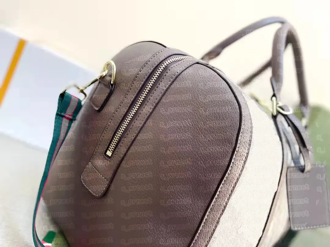 더플 백은 모든 여성 여행 가방 남성 클래식 더플 롤링 부드러운 가방 핸드 가방 핸드백 TOTE1949를 운반합니다.