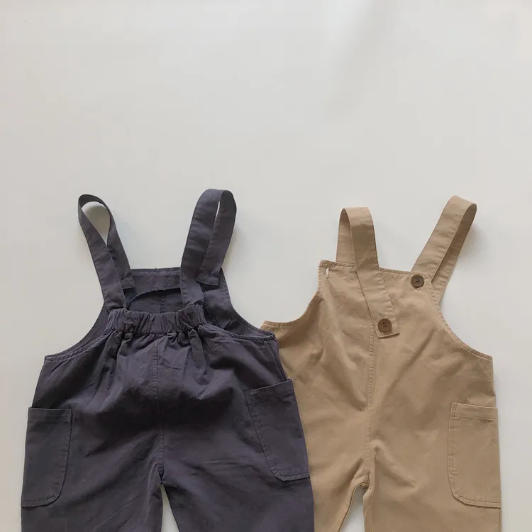 Criança bebê menina primavera e verão novo estilo com bolso algodão macacão macacão menino moda solta calças cortadas 210413