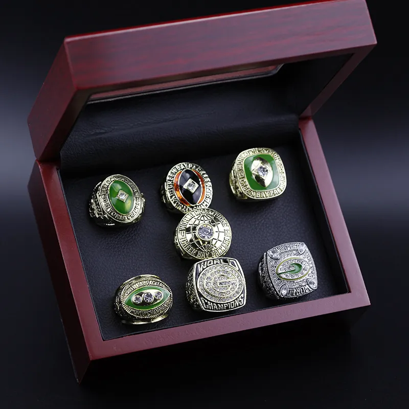 Tres anillos de piedra 7 piezas 1961 1962 1965 1966 1967 1996 2010 Anillo de campeonato Packer con vitrina de coleccionista 320D