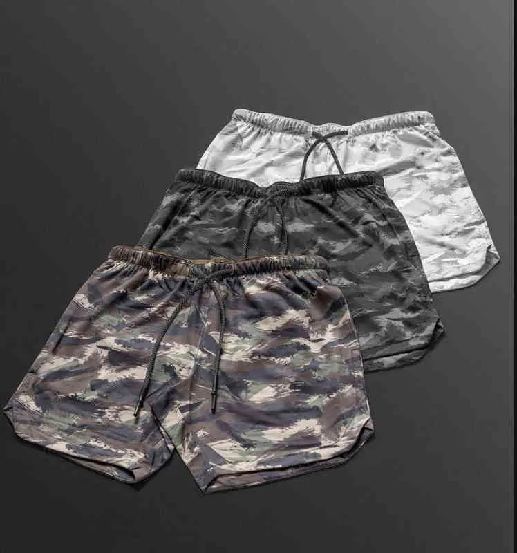 Fd69034710 Malha verão camuflagem shorts de gelo seda de gelo solto calças casuais calças de praia correndo esportes capris g1209